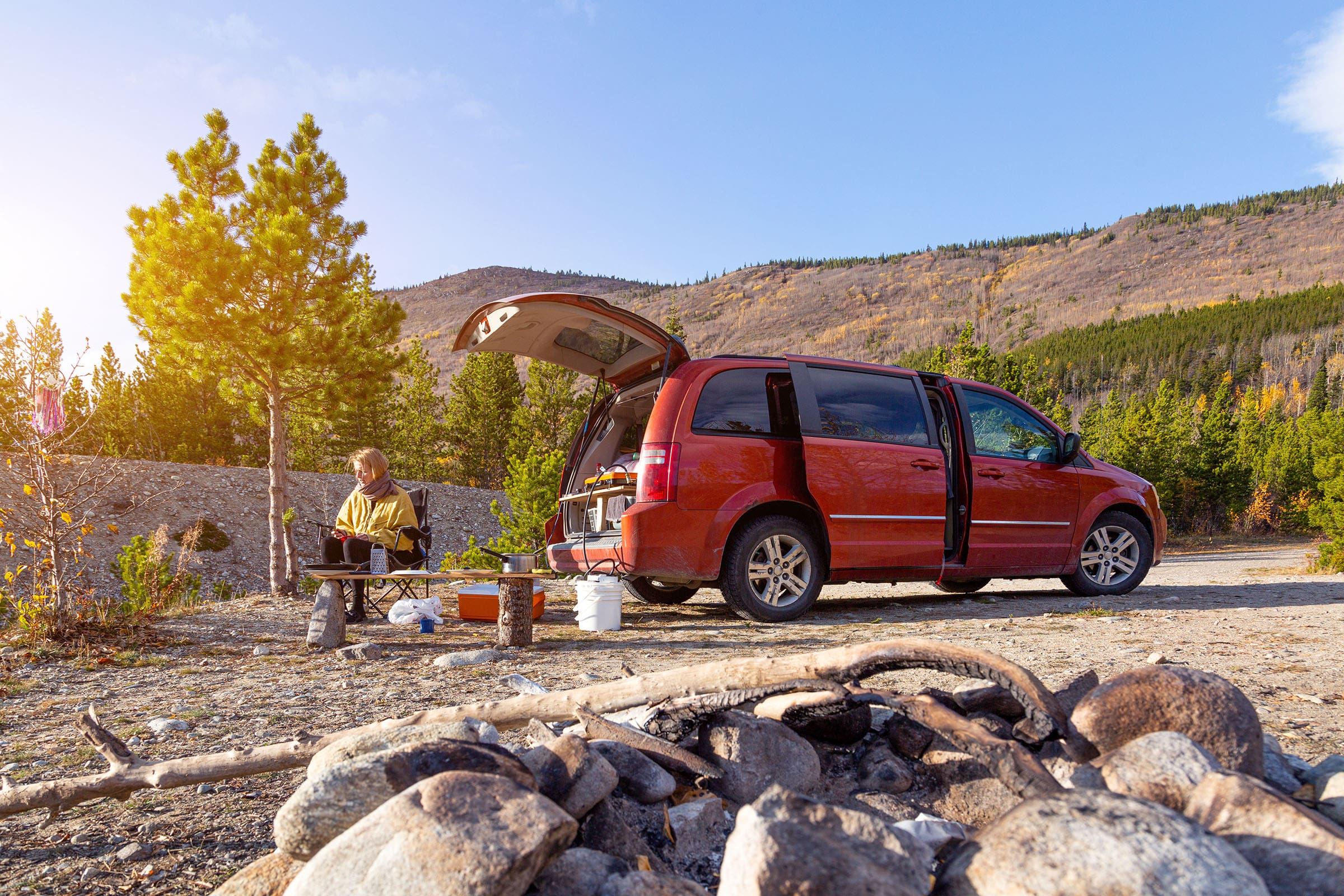 red mini van being used as a camper