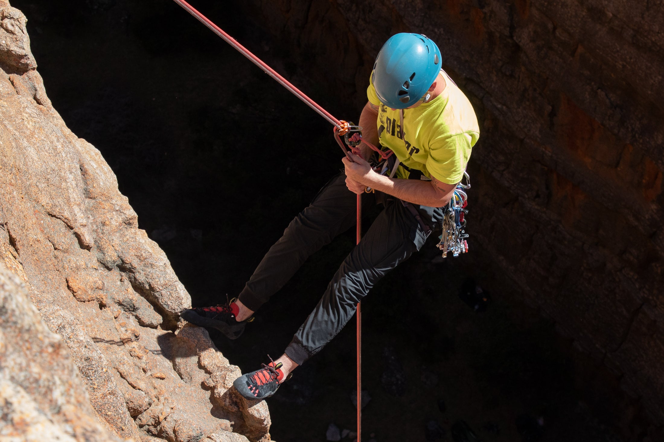 climber rappelling with two ropes