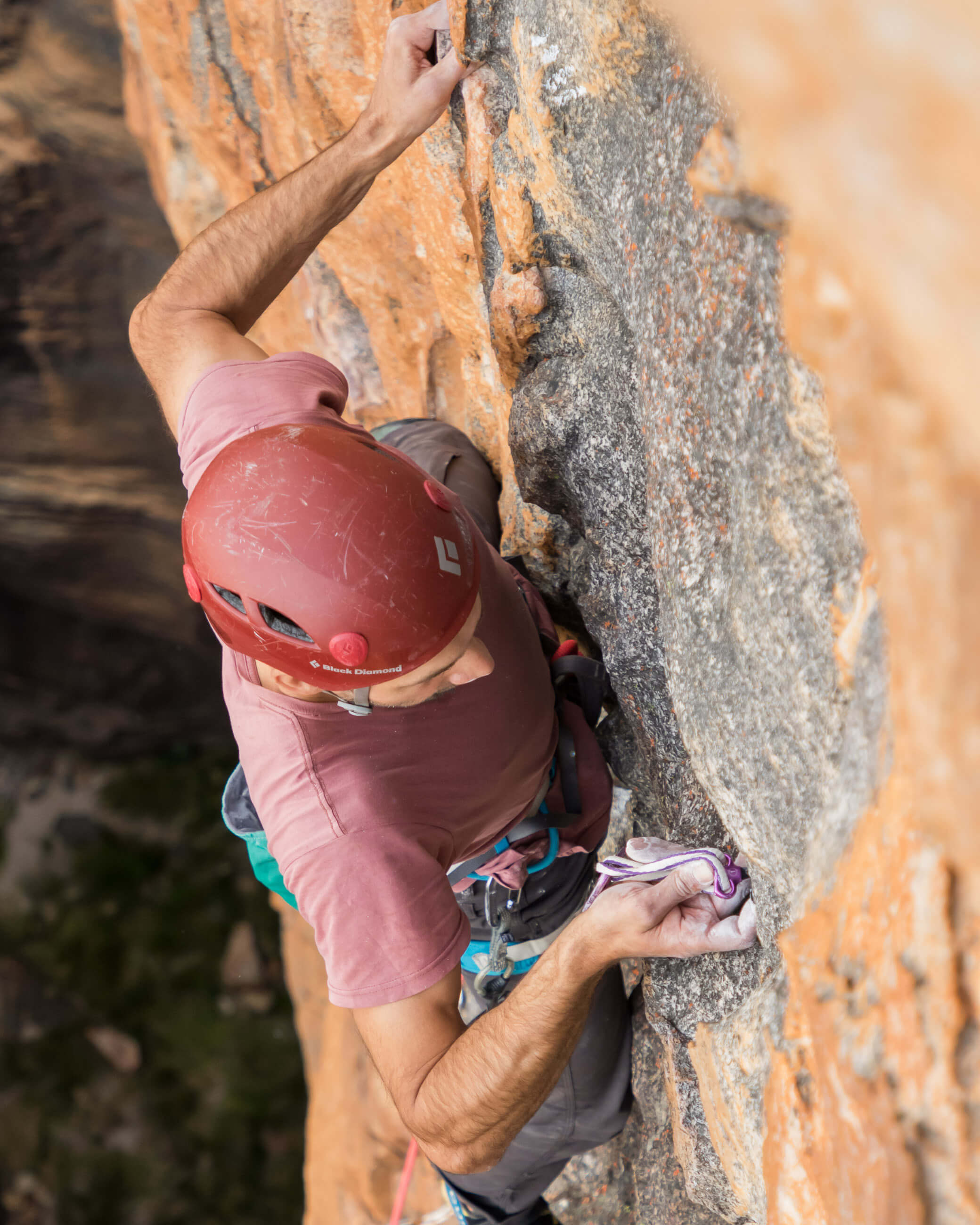 climber placing cam