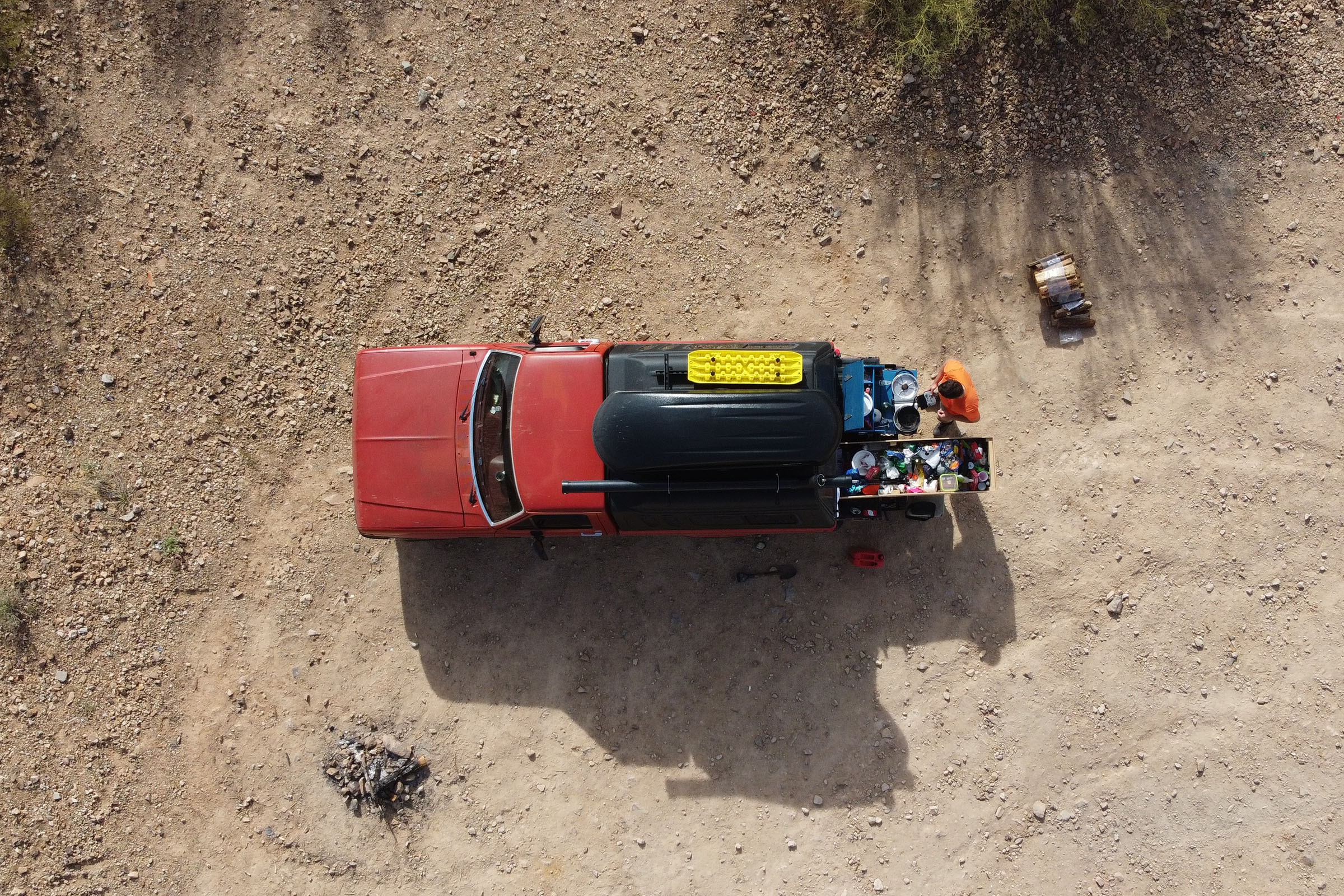 bird’s eye view of red pickup truck camper