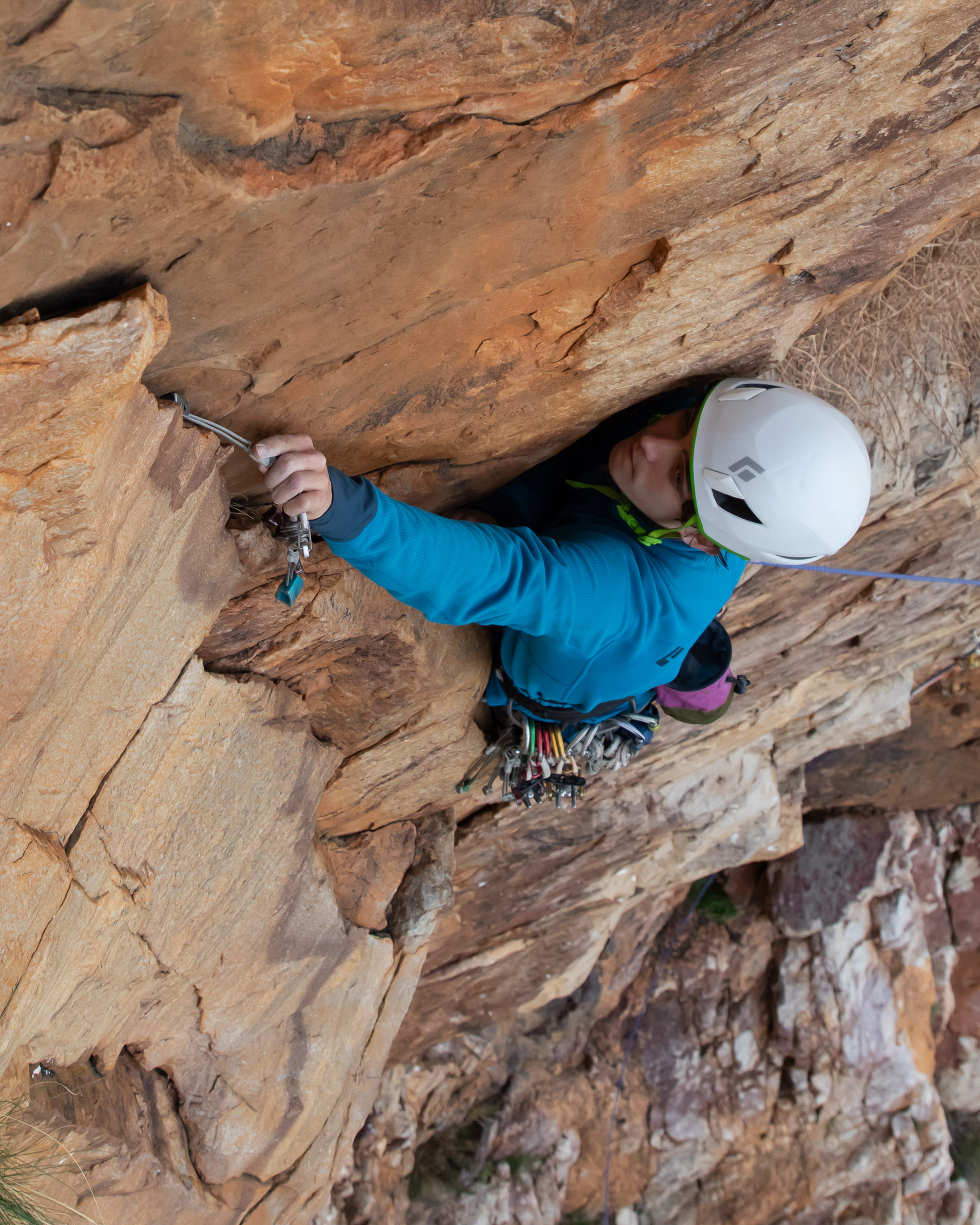 climber placing nut