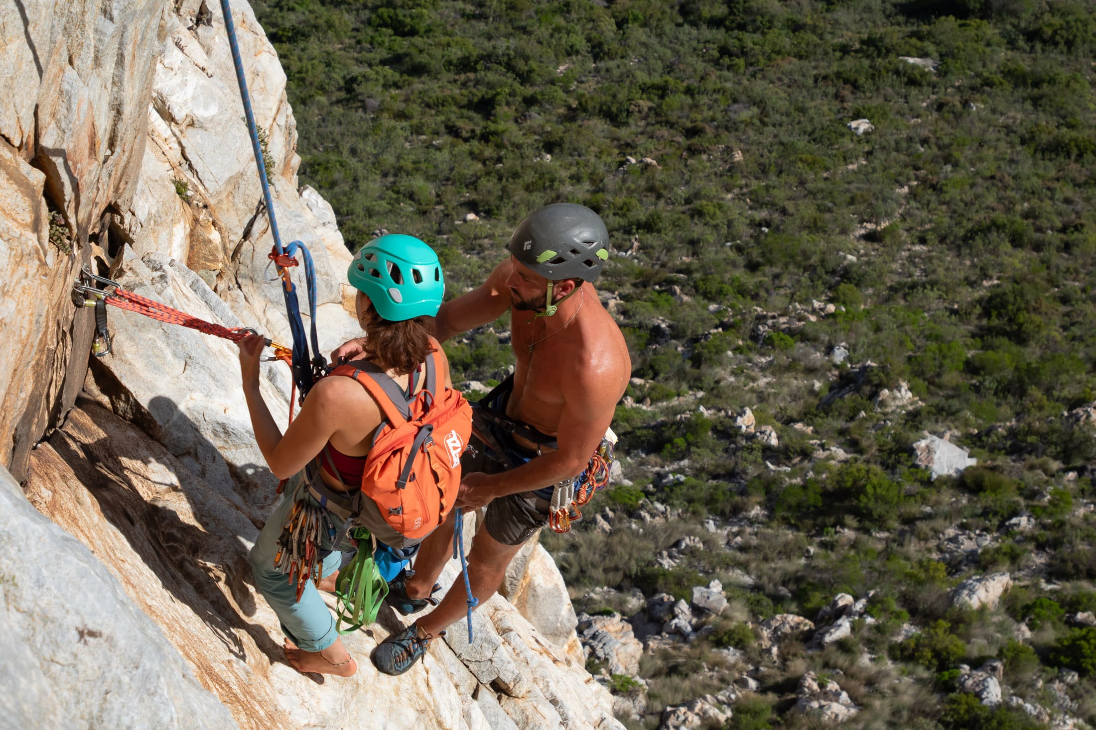 two climbers at rappel station