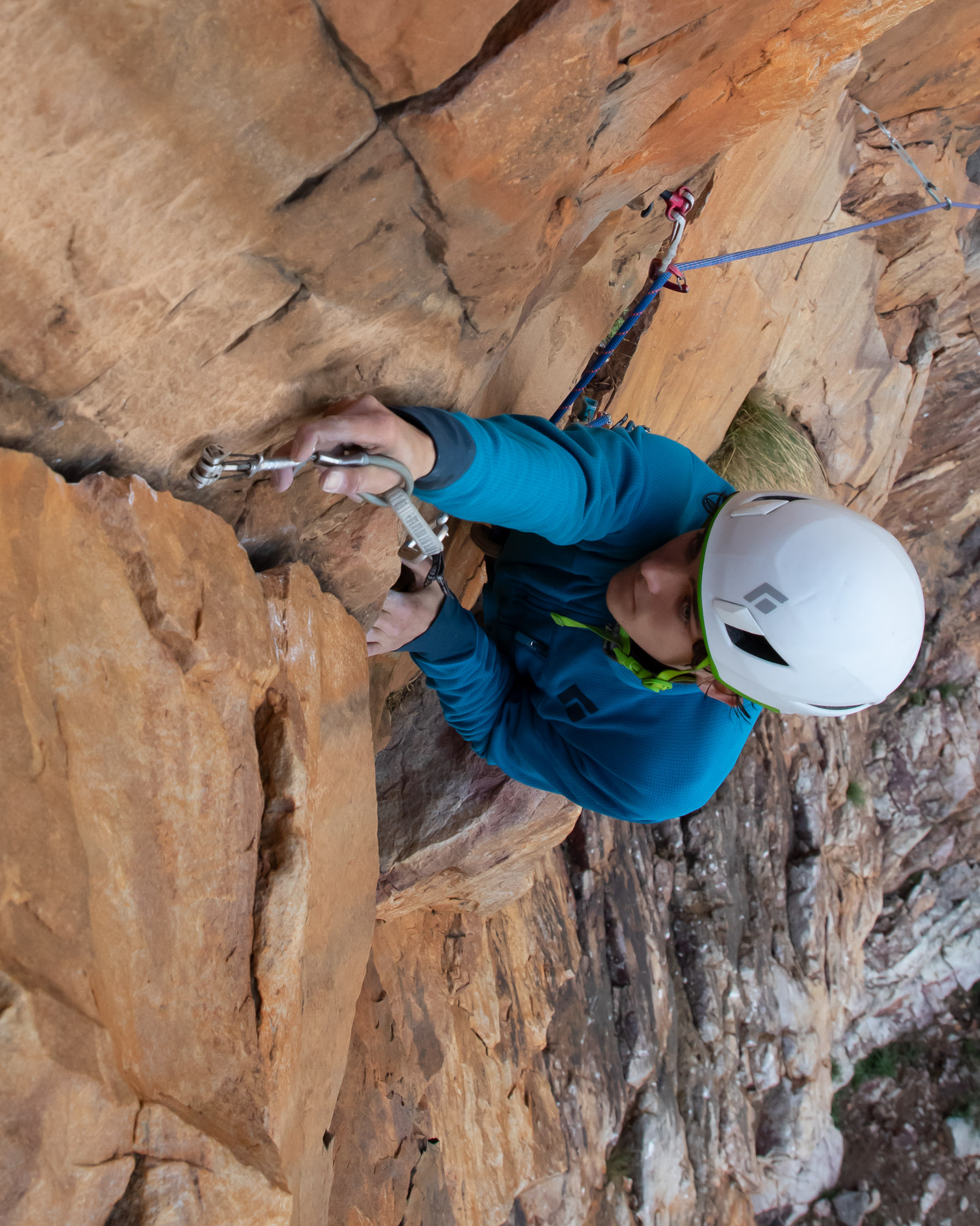 climber placing cam