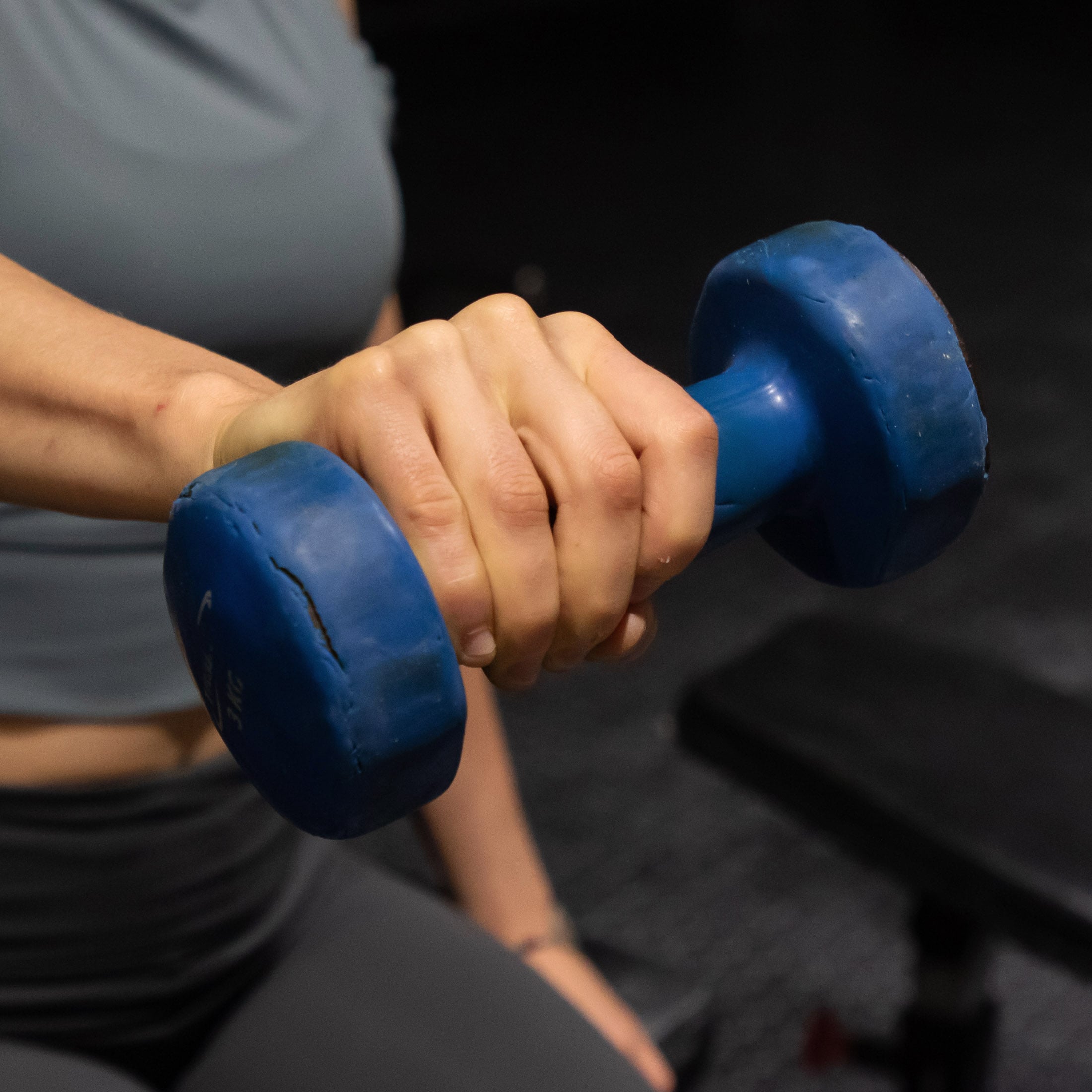 Climber performing wrist curls