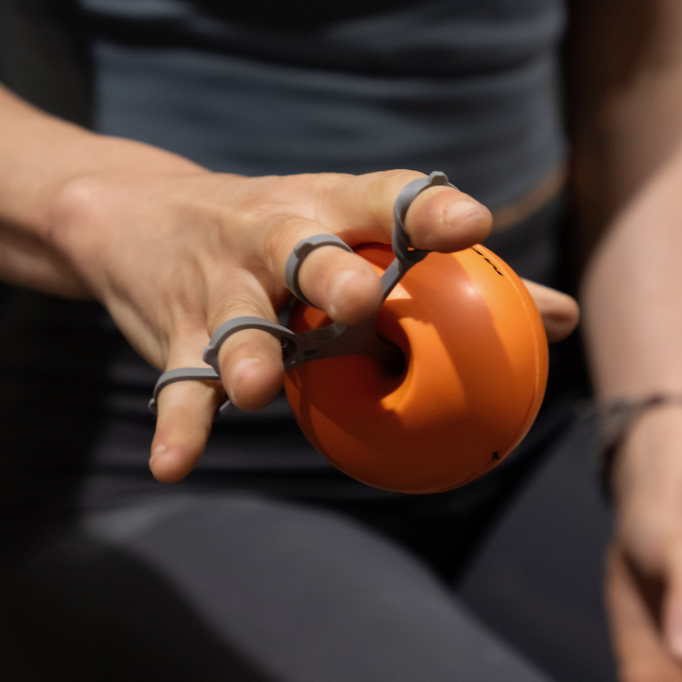 Climber doing finger extensor exercises