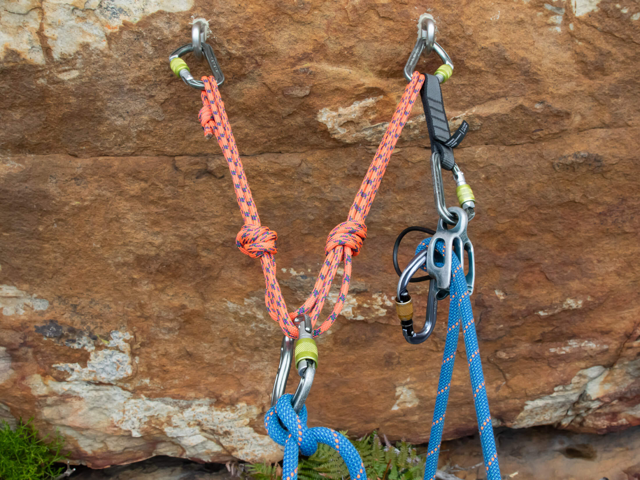 belay device connected to anchor with redirect