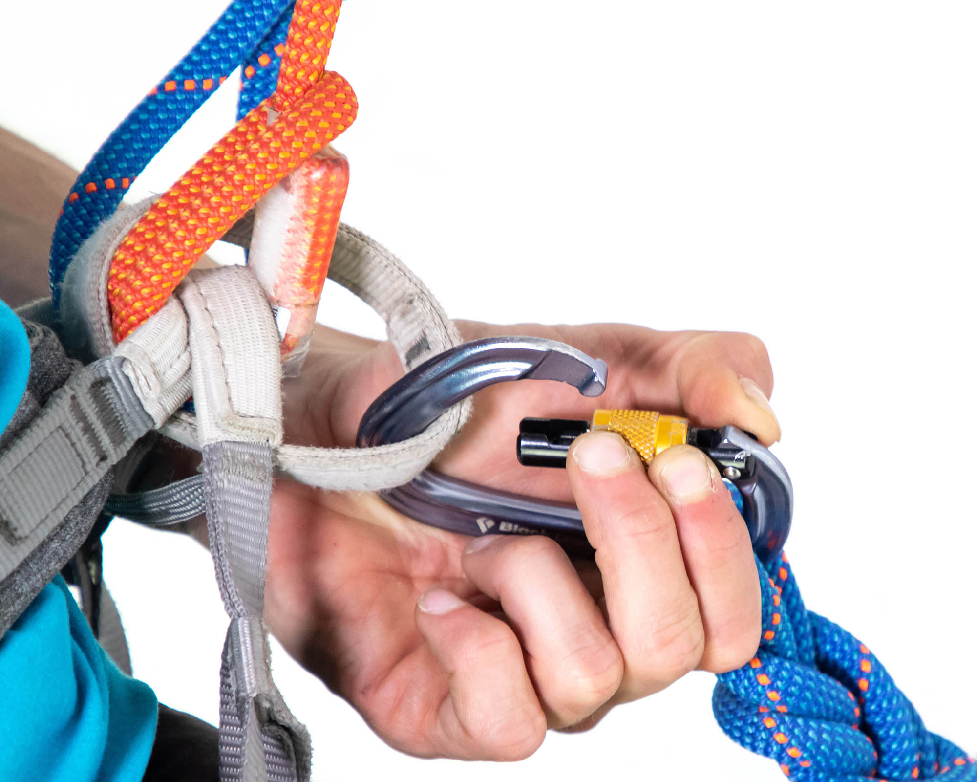 clipping overhand knot to belay loop