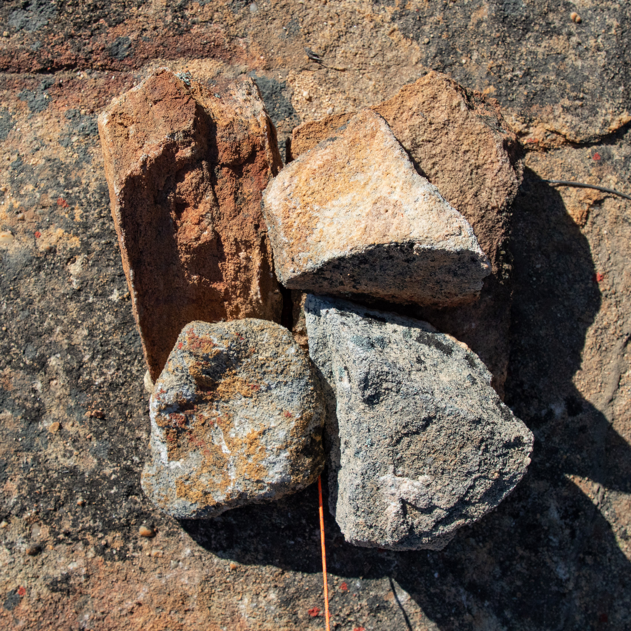 pile of rocks used as tarp anchor