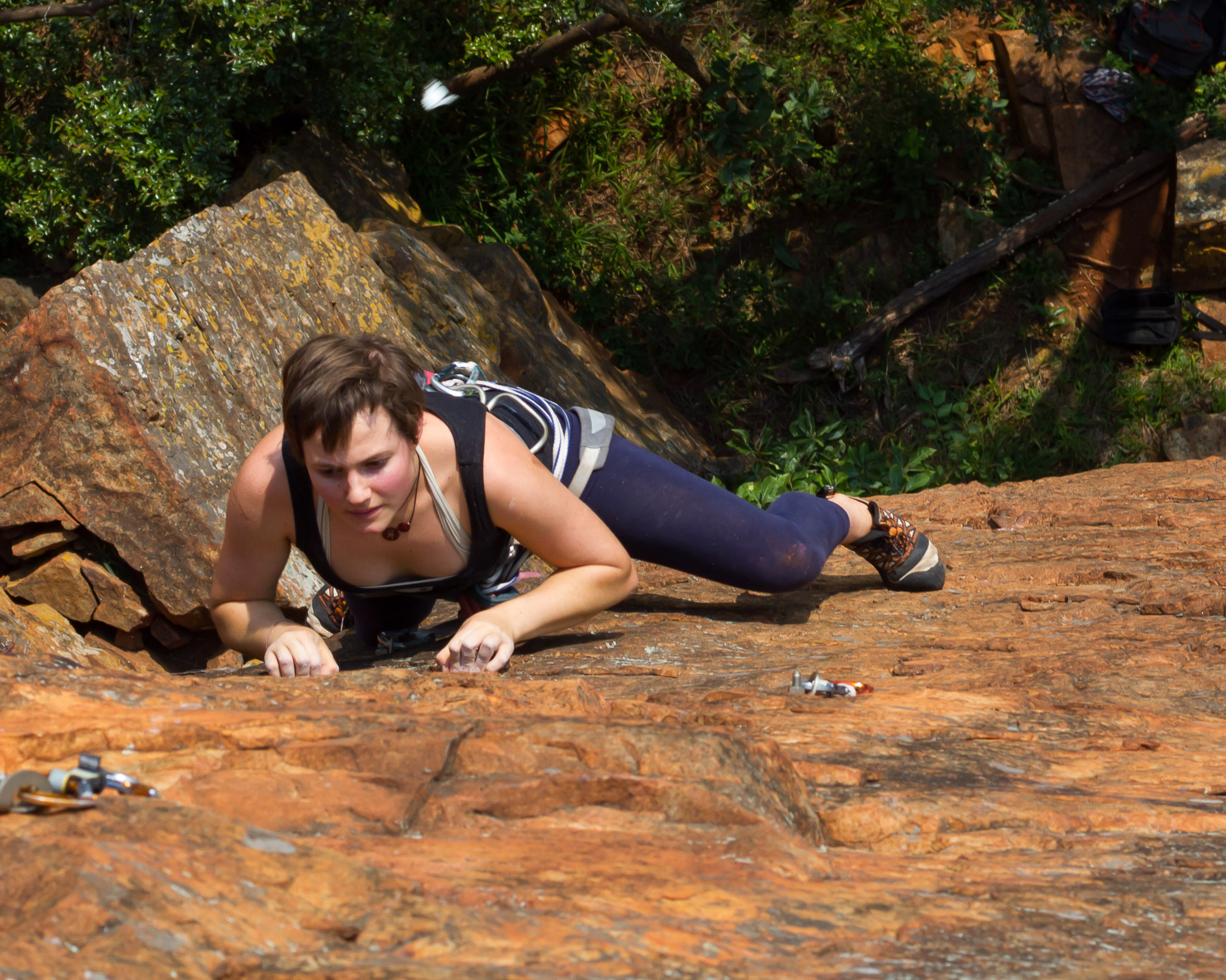 climber with feet underneath her