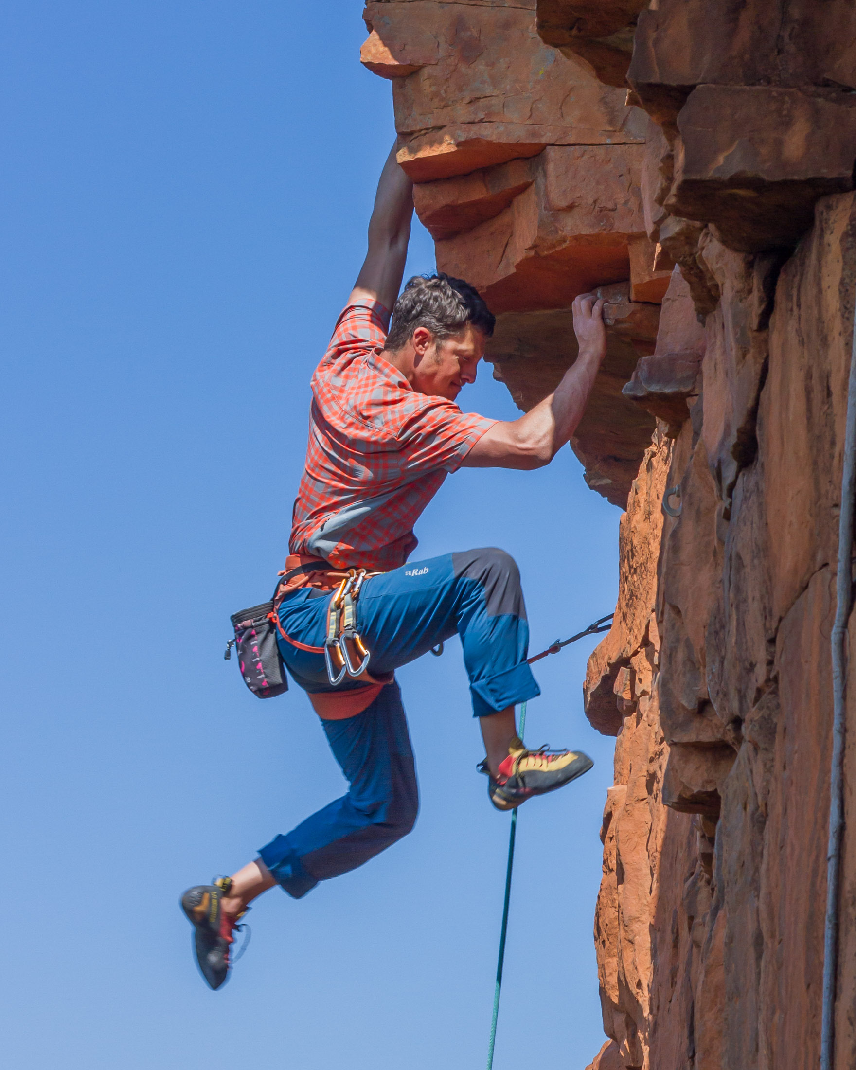 climber making dynamic move