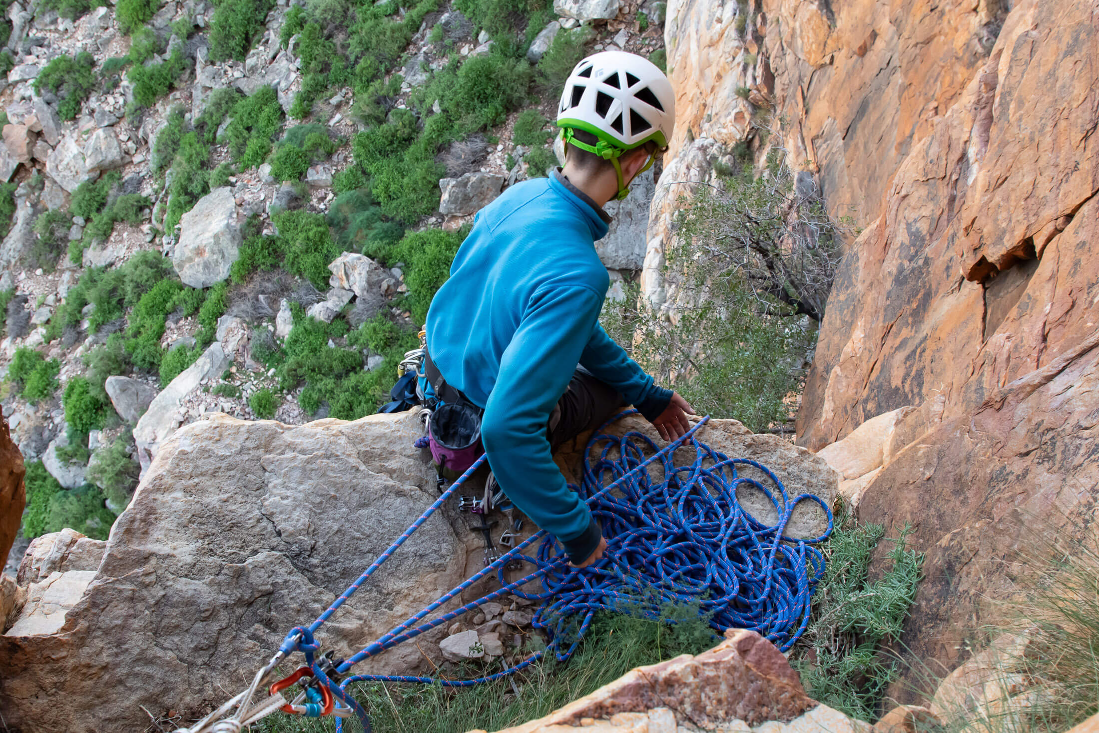 climber belaying off anchor