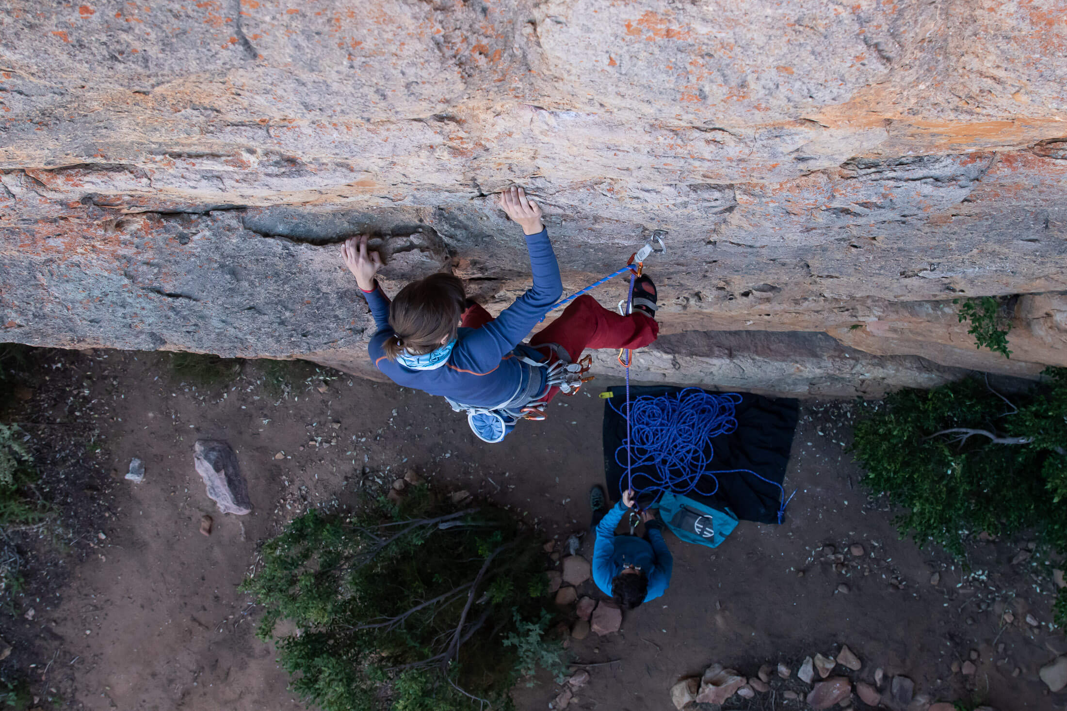 Climbing leading a route