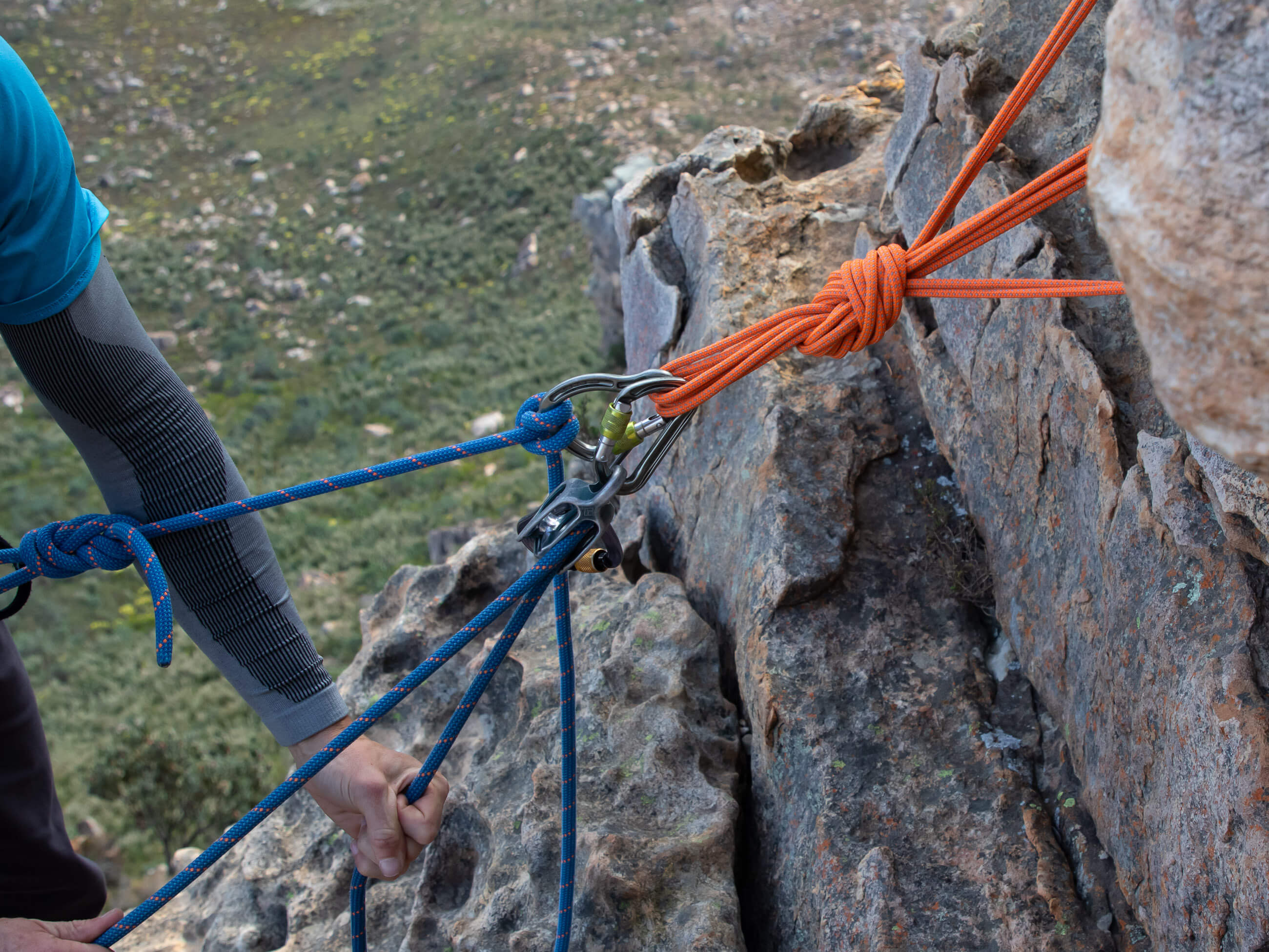 climber belaying from above