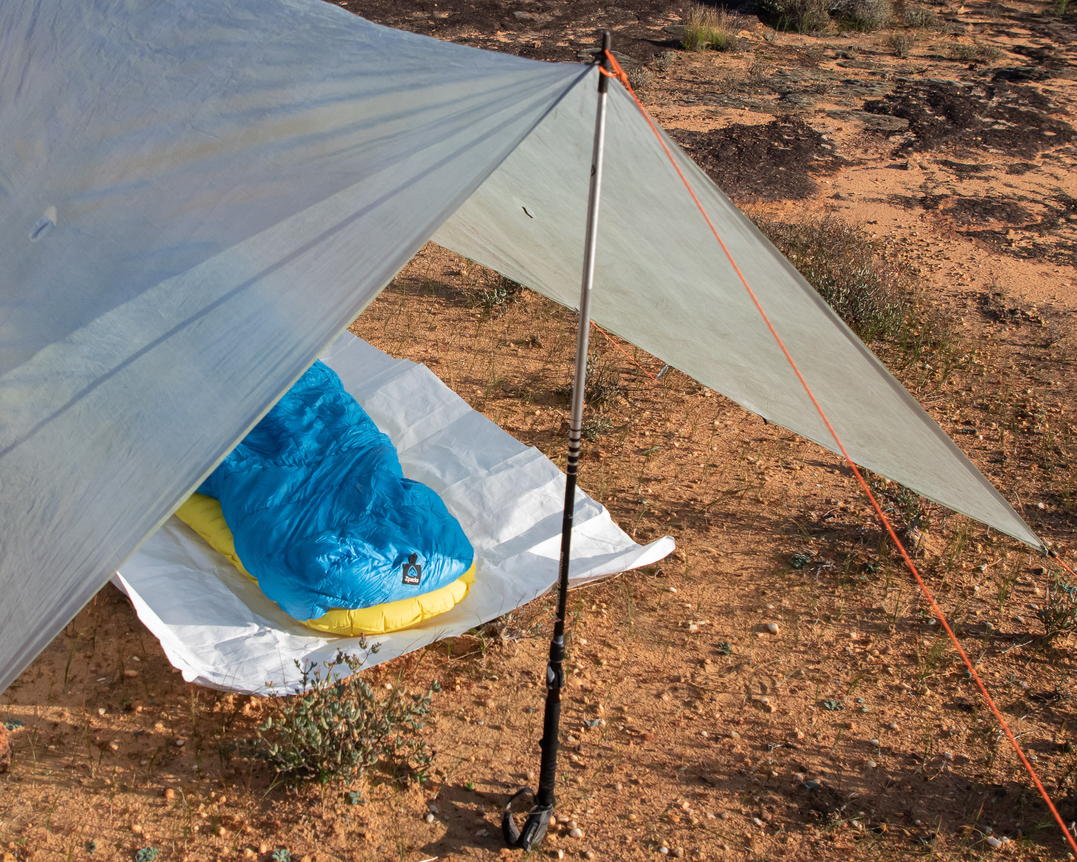 quilt and air pad under tarp