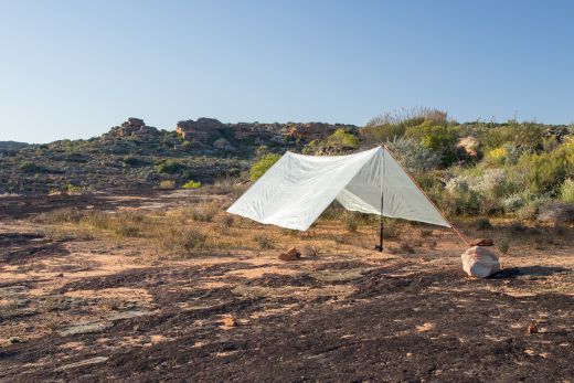 ultralight tarp pitched in A-frame configuration