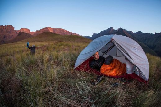 hiker wakes up to a sunrise in the Drakensberg