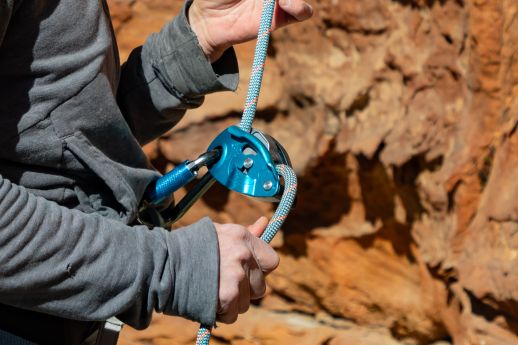 climber belaying with Grigri