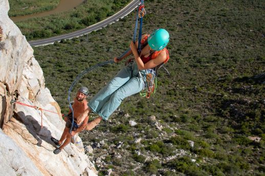 climber rappelling multi-stage route
